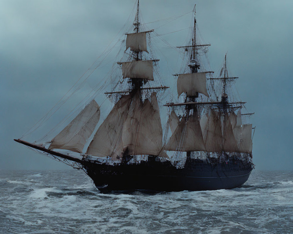 Traditional sailing ship with multiple masts in stormy seas