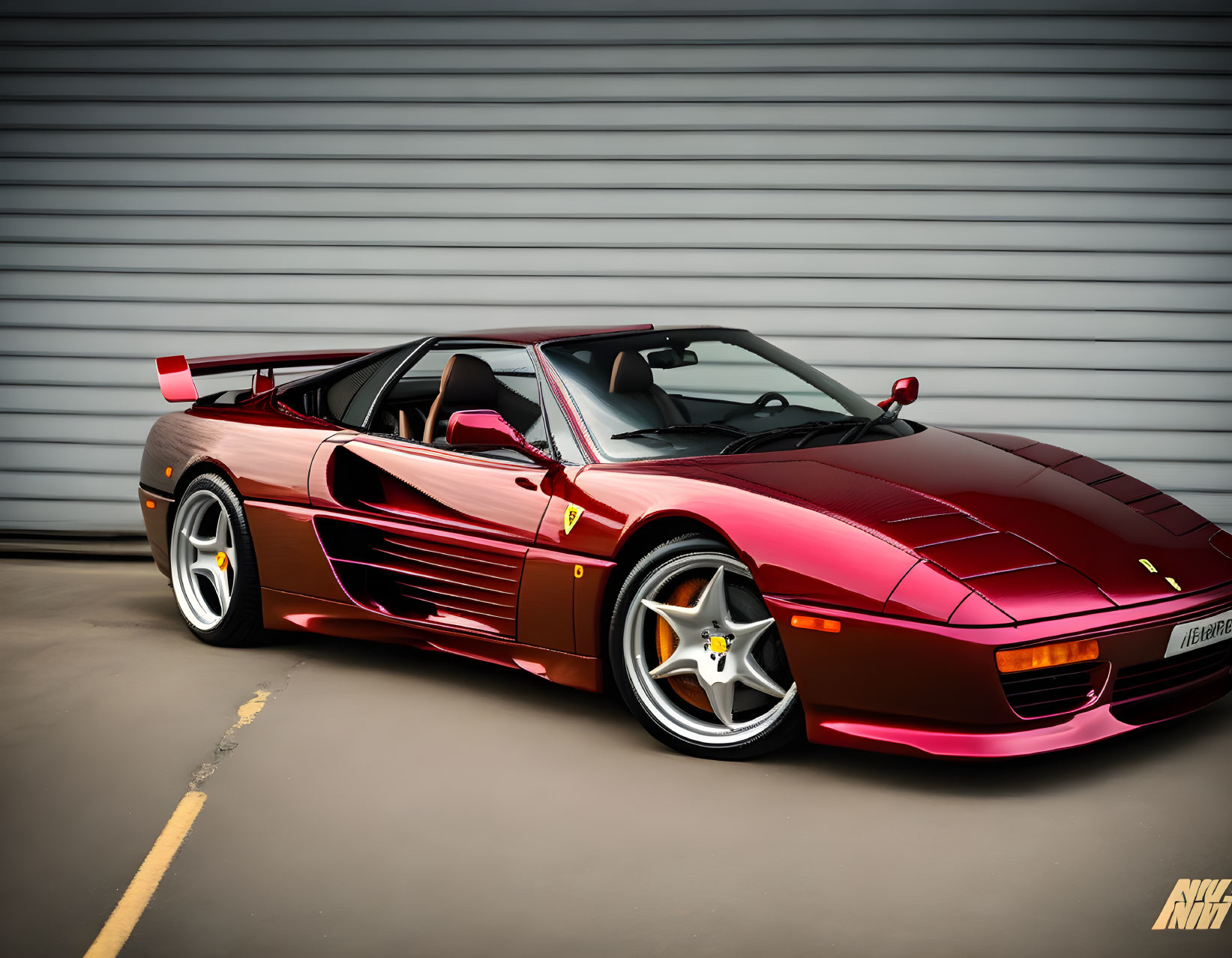 Red Ferrari F40 with large spoiler, silver wheels, and pop-up headlights parked in front of metal