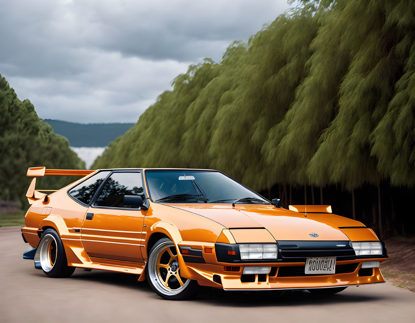 Vintage Orange Sports Car with Large Spoiler and Racing Stripes on Road