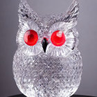 Glass-Like Owl with Red Eyes and Gears on Grey Background