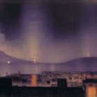 Nocturnal cityscape with waterfront, hill, and stormy sky