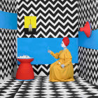 Person in Yellow Robe Painting in Geometric Room