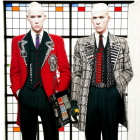 Stylized mannequins in fashionable menswear on red and white grid background