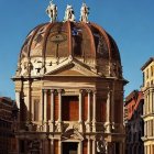 Ornate Baroque-style building with decorative dome and columns