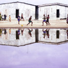 Urban scene painting with people near buildings and reflections in puddle