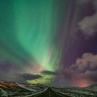 Surreal landscape with intricate structures under starry sky