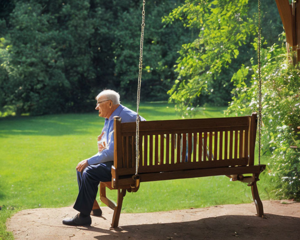 Elderly person sitting on wooden swing in peaceful park surrounded by greenery