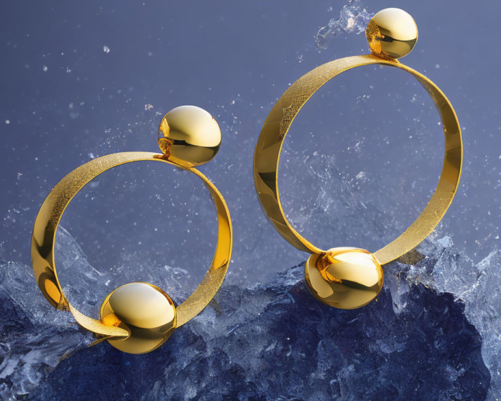 Golden Hoop Earrings with Spherical Embellishments in Water Splash Photo