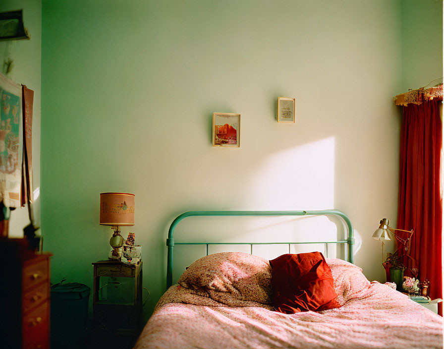 Cozy Bedroom with Red Bedspread and Vintage Decor