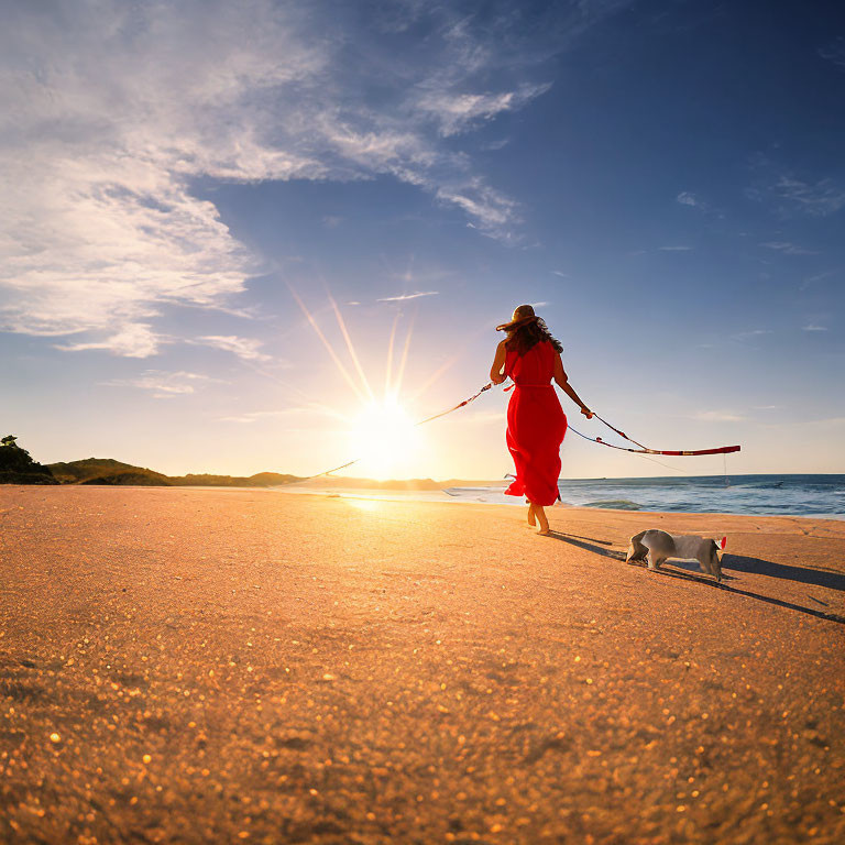 Person in Red Dress Walking Dog on Beach at Sunset