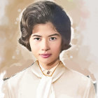 Portrait of woman with soft wavy hair, white blouse, and long earrings