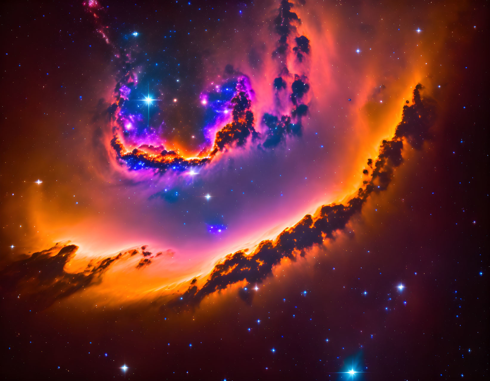 Colorful space image with orange and purple interstellar gas clouds and bright stars.