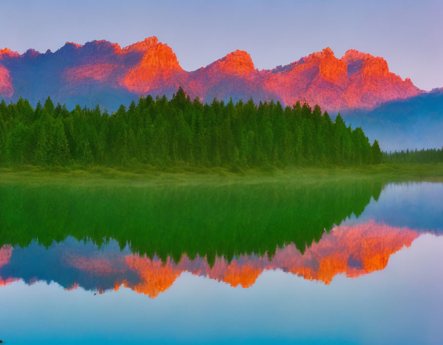 Tranquil Misty Lake Sunrise with Pink Mountain Peaks