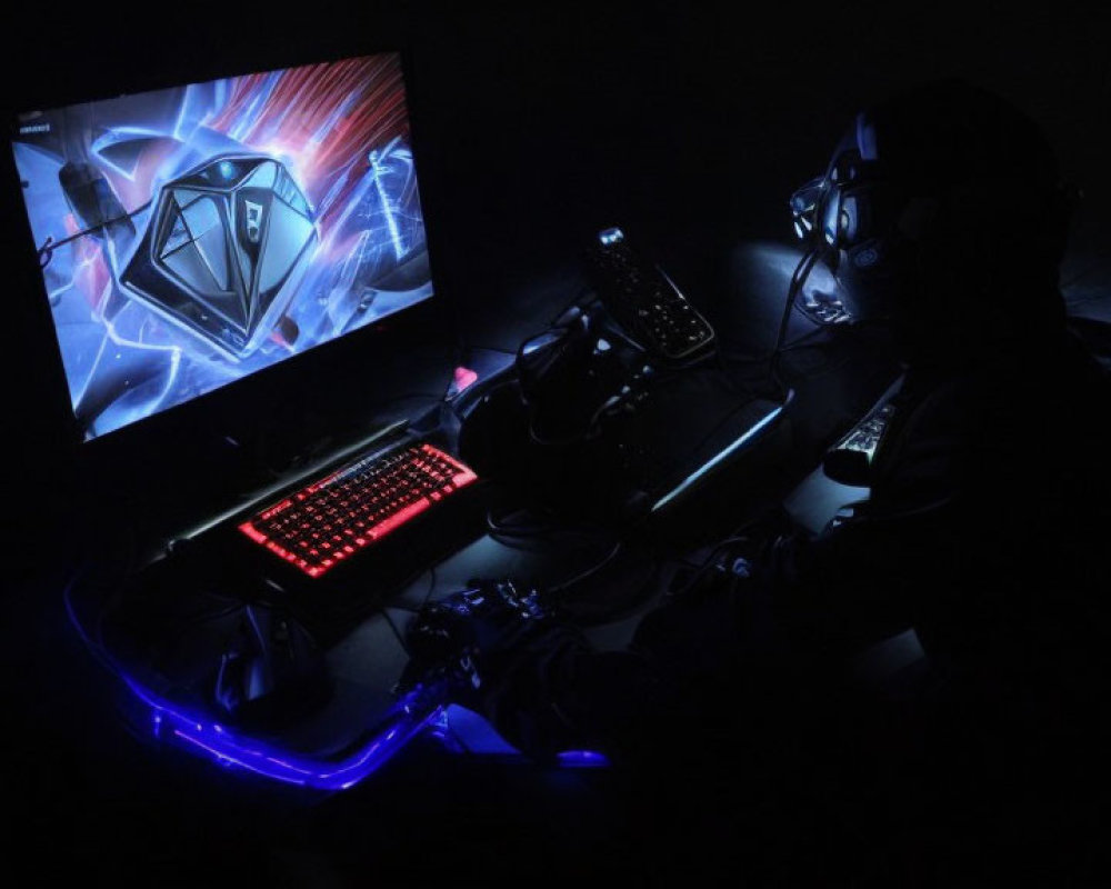 Person gaming in dark room with backlit keyboard and glowing PC case.