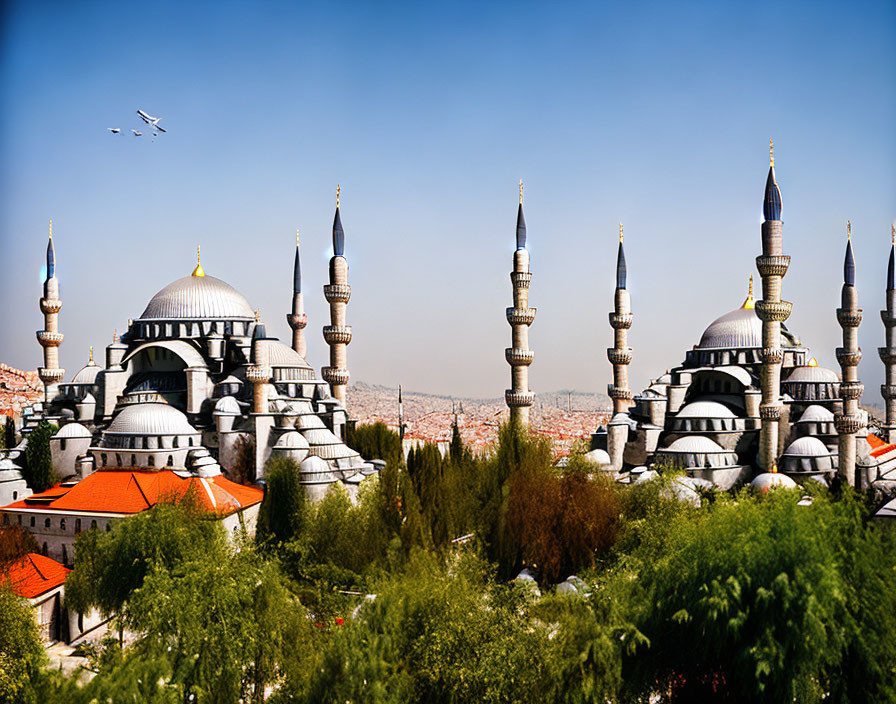 Iconic Sultan Ahmed Mosque with cascading domes and six minarets under clear blue sky,