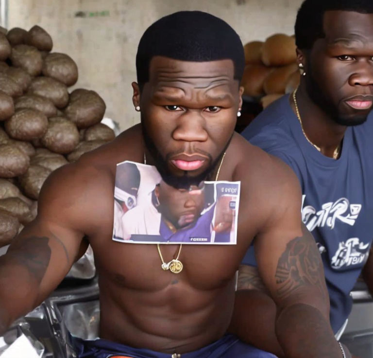 Muscular man with tattoos holds photo, another man in background