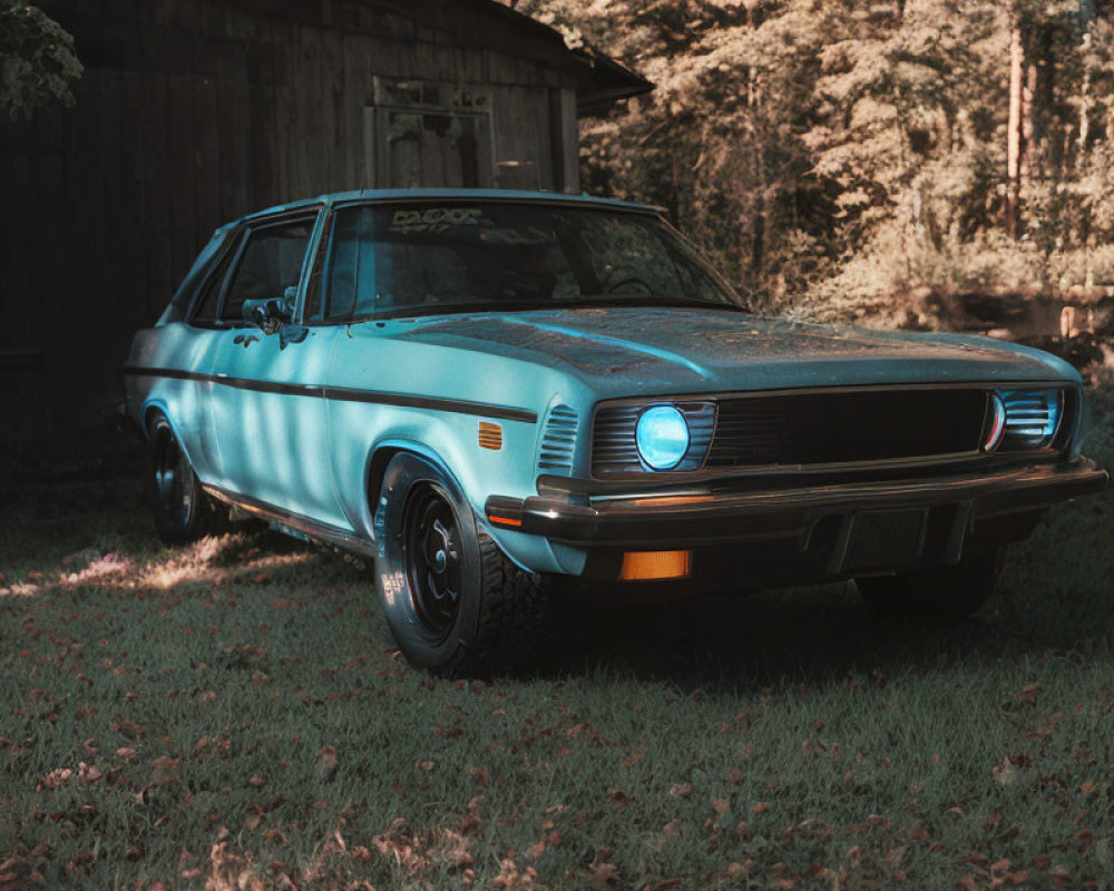 Vintage Blue Car Parked in Front of Wooden Shed with Headlight On