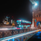 Neon-lit futuristic city street at night with illuminated buildings