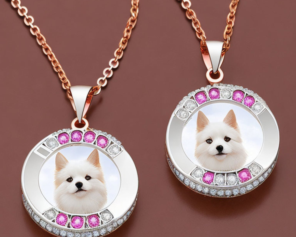 Circular white dog pendants with gemstones on rose gold chains on brown background