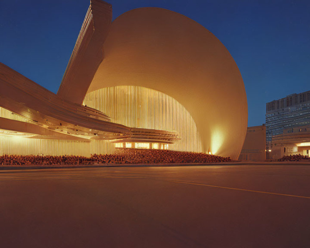 Unique Shell-Like Modern Building with Curved Facade at Dusk