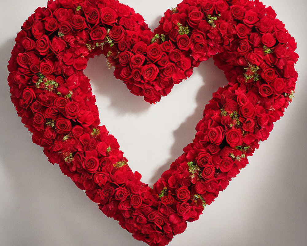 Red Rose Heart-Shaped Arrangement on White Background