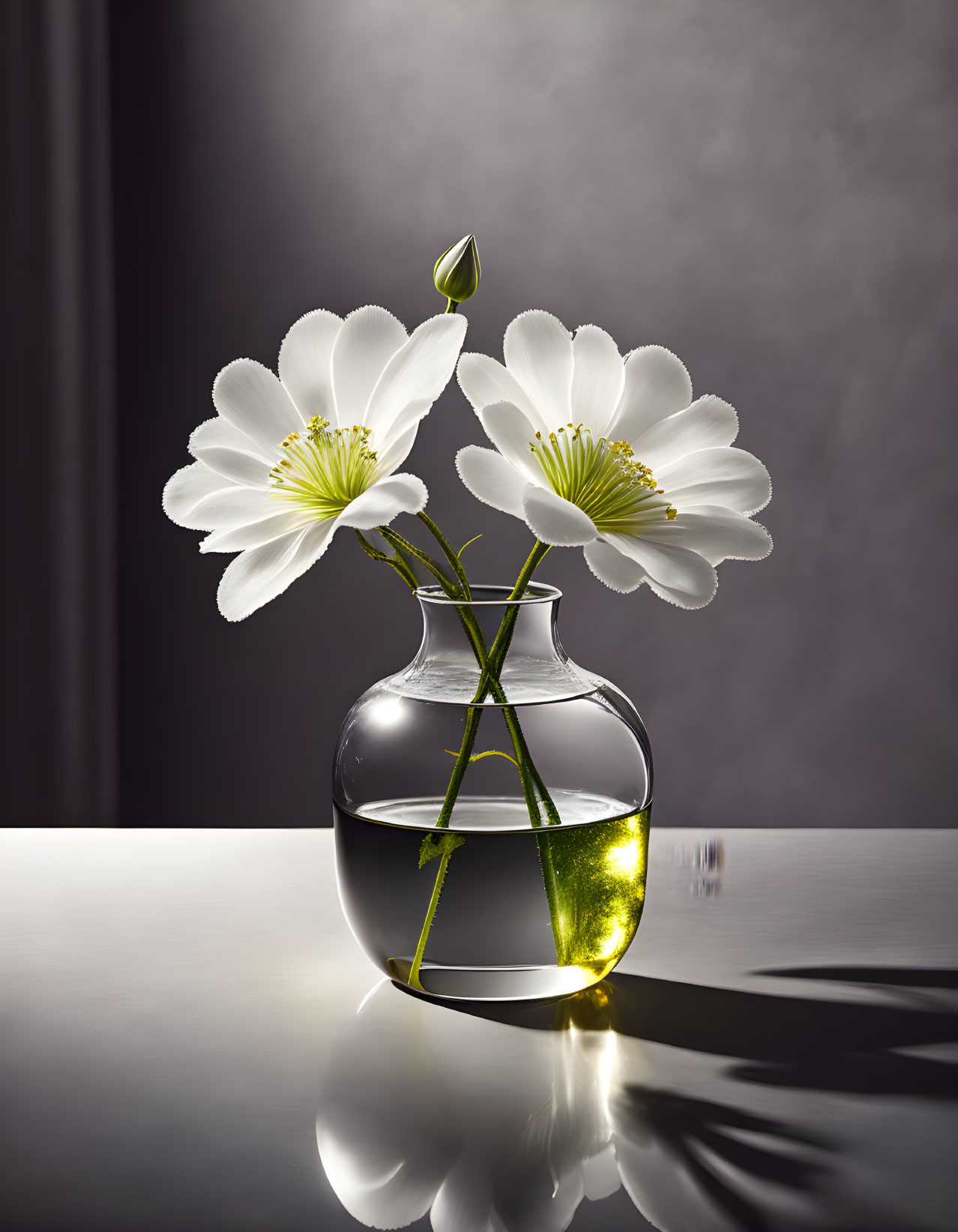 White flowers with stamens in glass vase on reflective surface