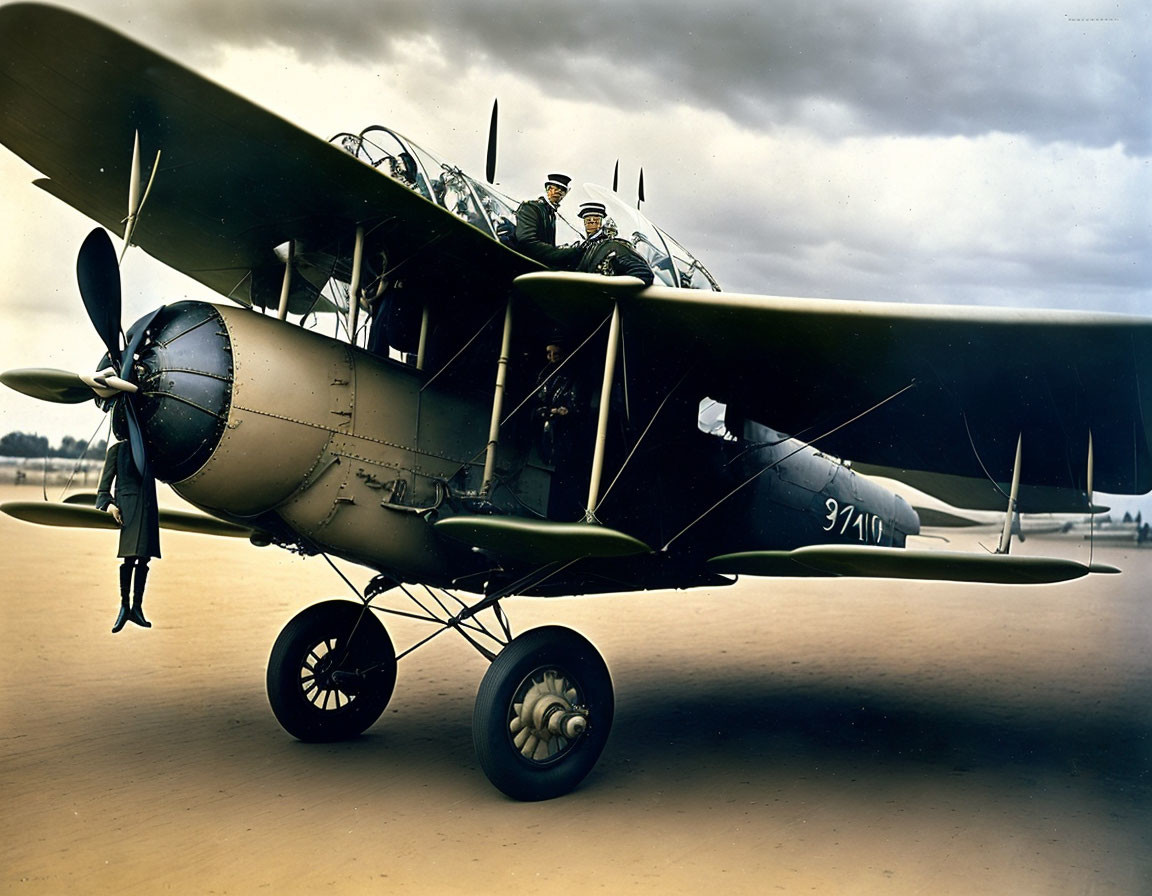 Vintage World War II era military biplane with propeller and open cockpit on a runway