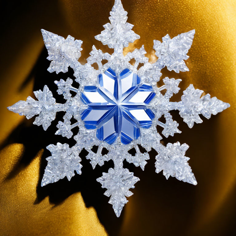 Detailed Crystal Snowflake Ornament on Golden Fabric Background