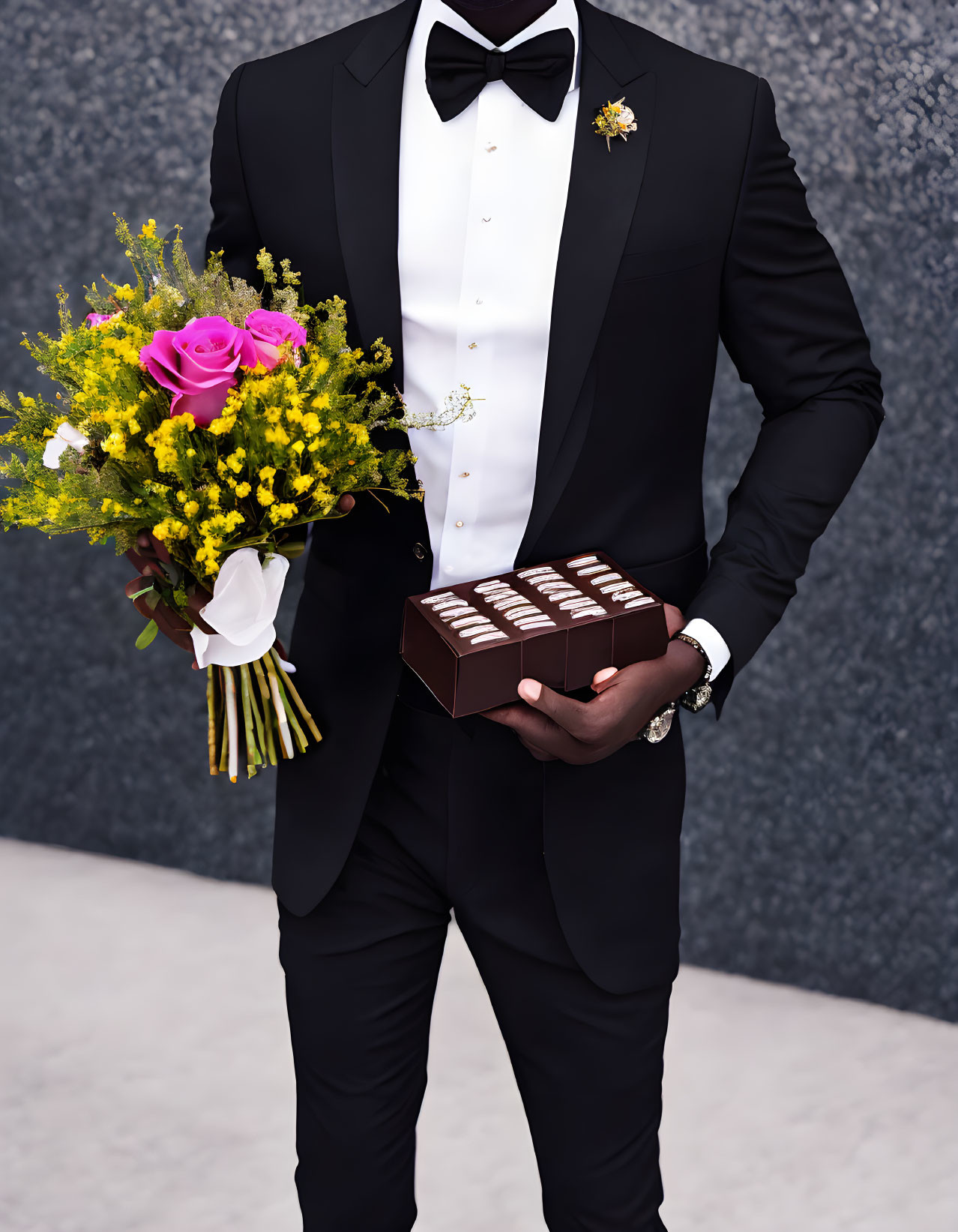 Man in Black Suit Holding Bouquet of Yellow Wildflowers, Pink Roses, and Chocolates