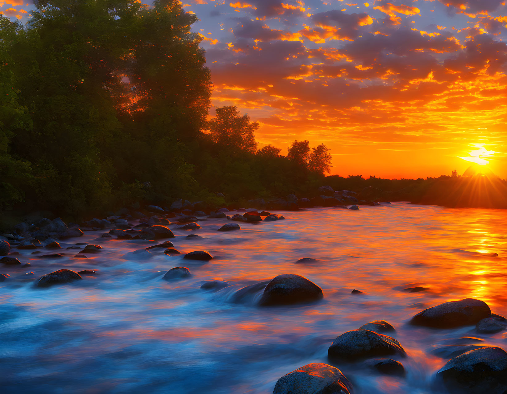 Scenic river sunset with smooth water and lush trees