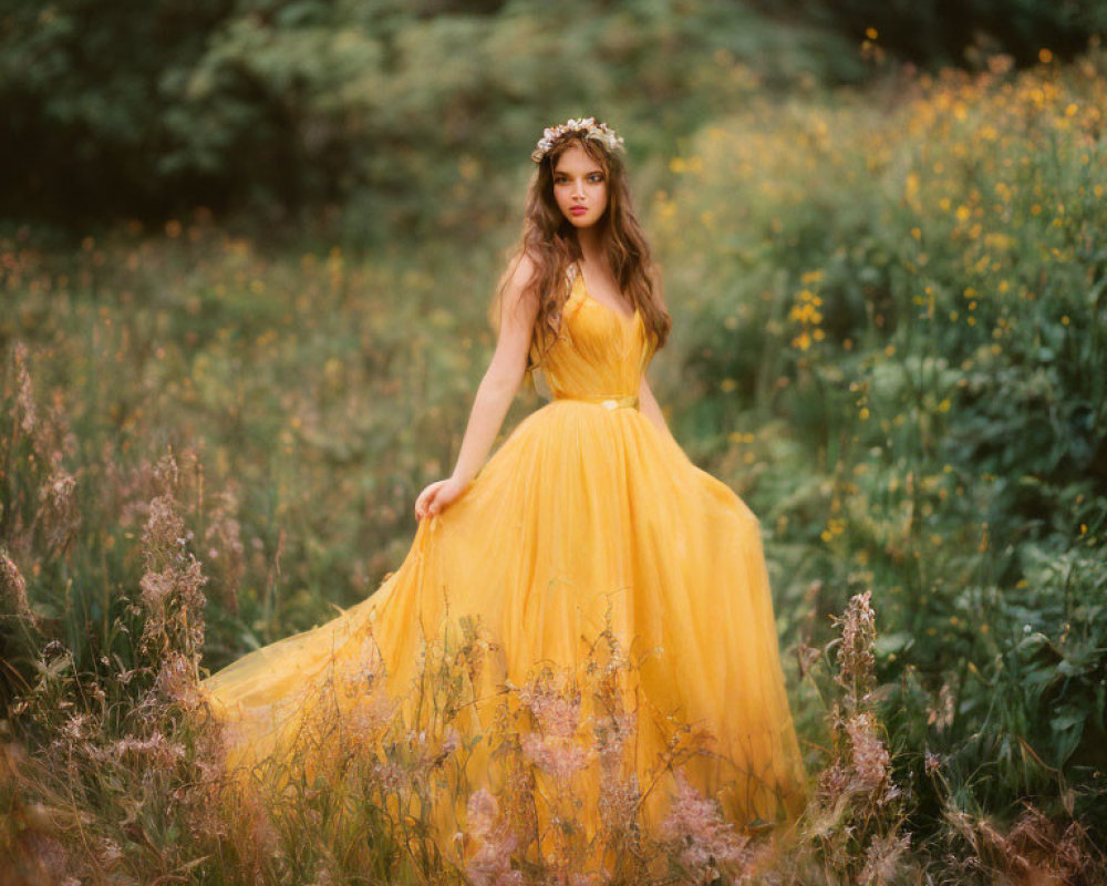 Woman in Yellow Gown Stands in Wildflower Field