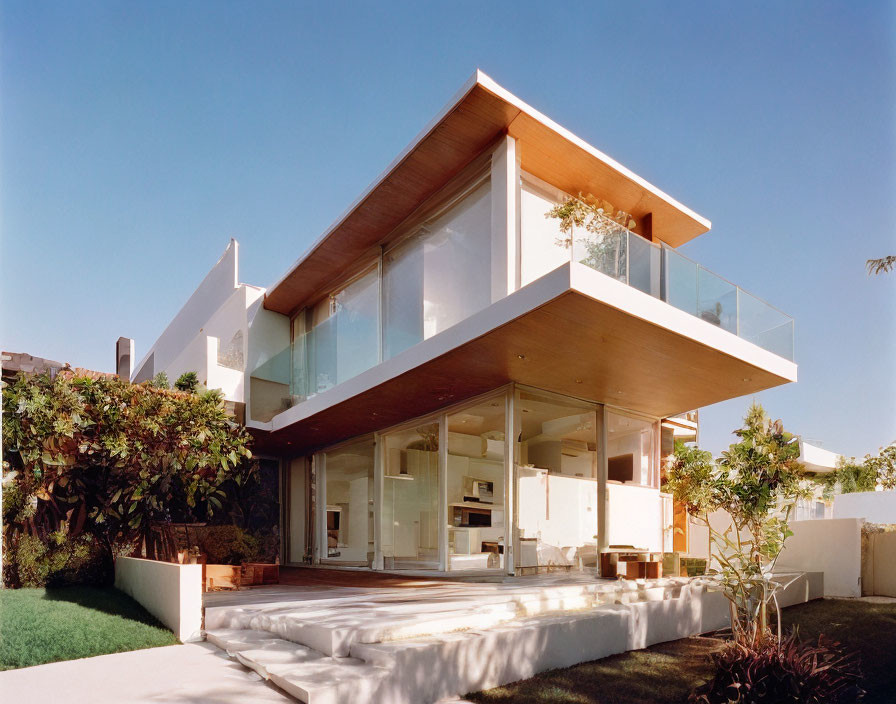 Contemporary House with Large Glass Windows and Flat Roof