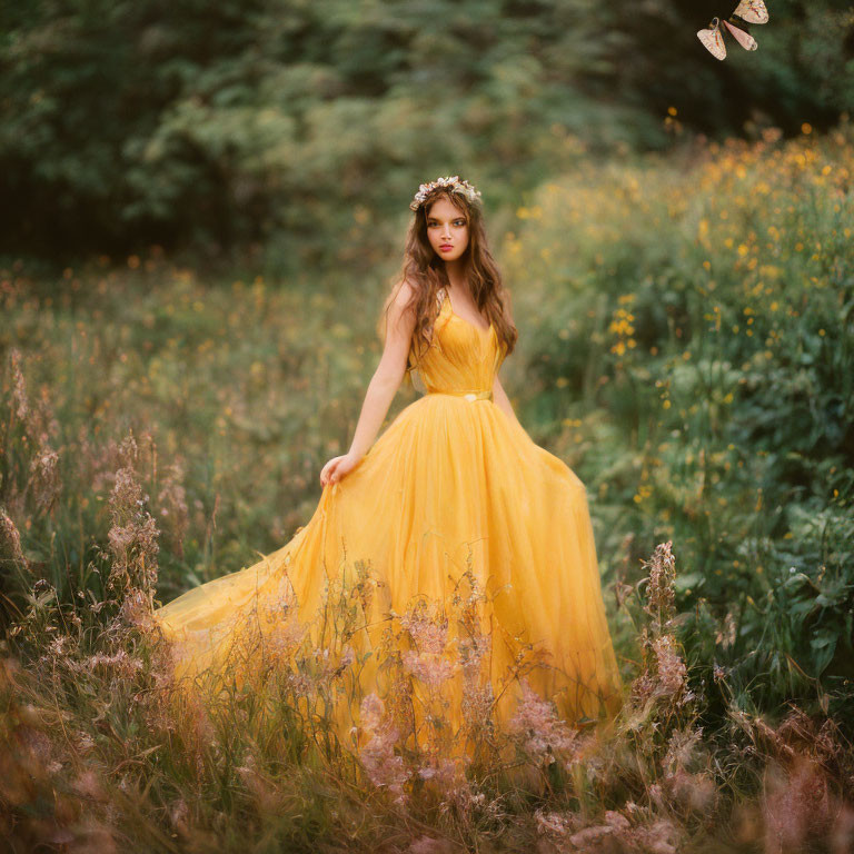 Woman in Yellow Gown Stands in Wildflower Field