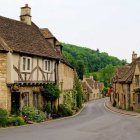 Traditional houses with colorful shutters on quaint village street