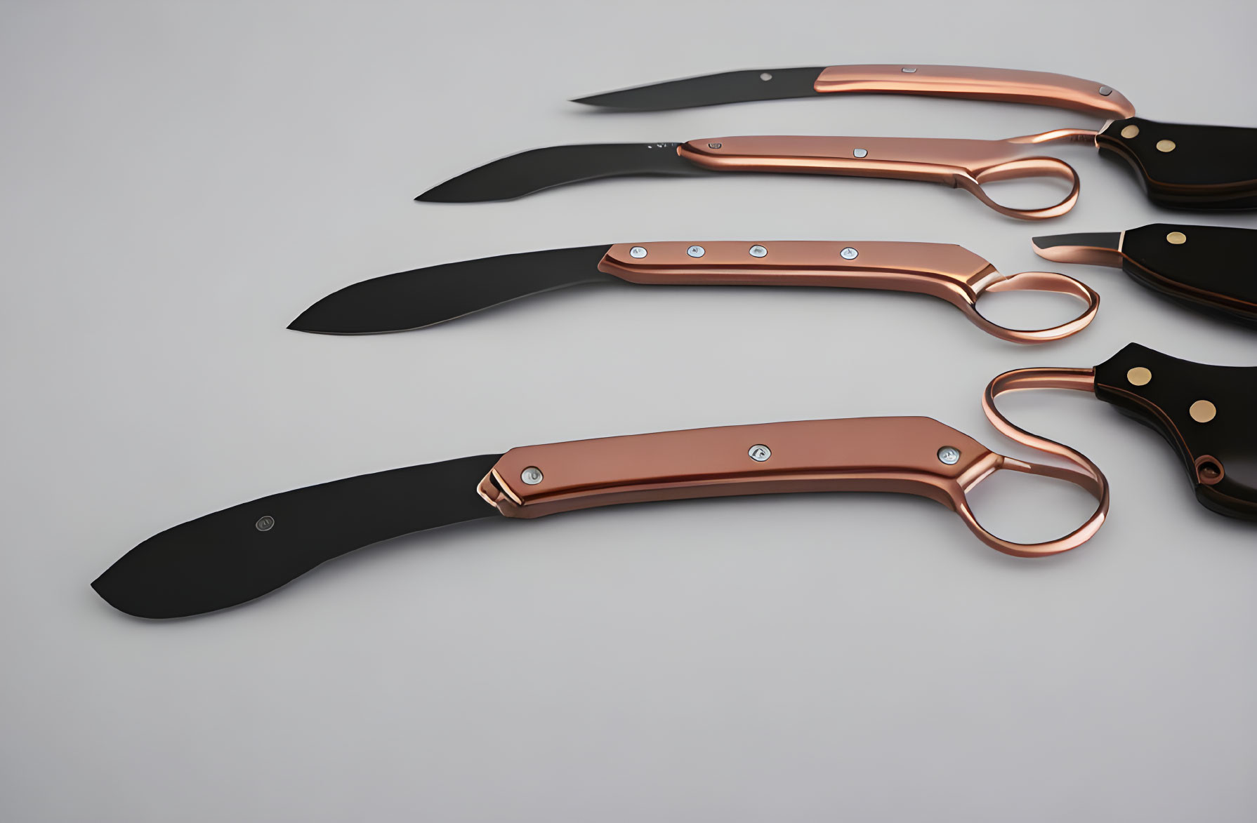 Black-bladed knives with copper accents on light background