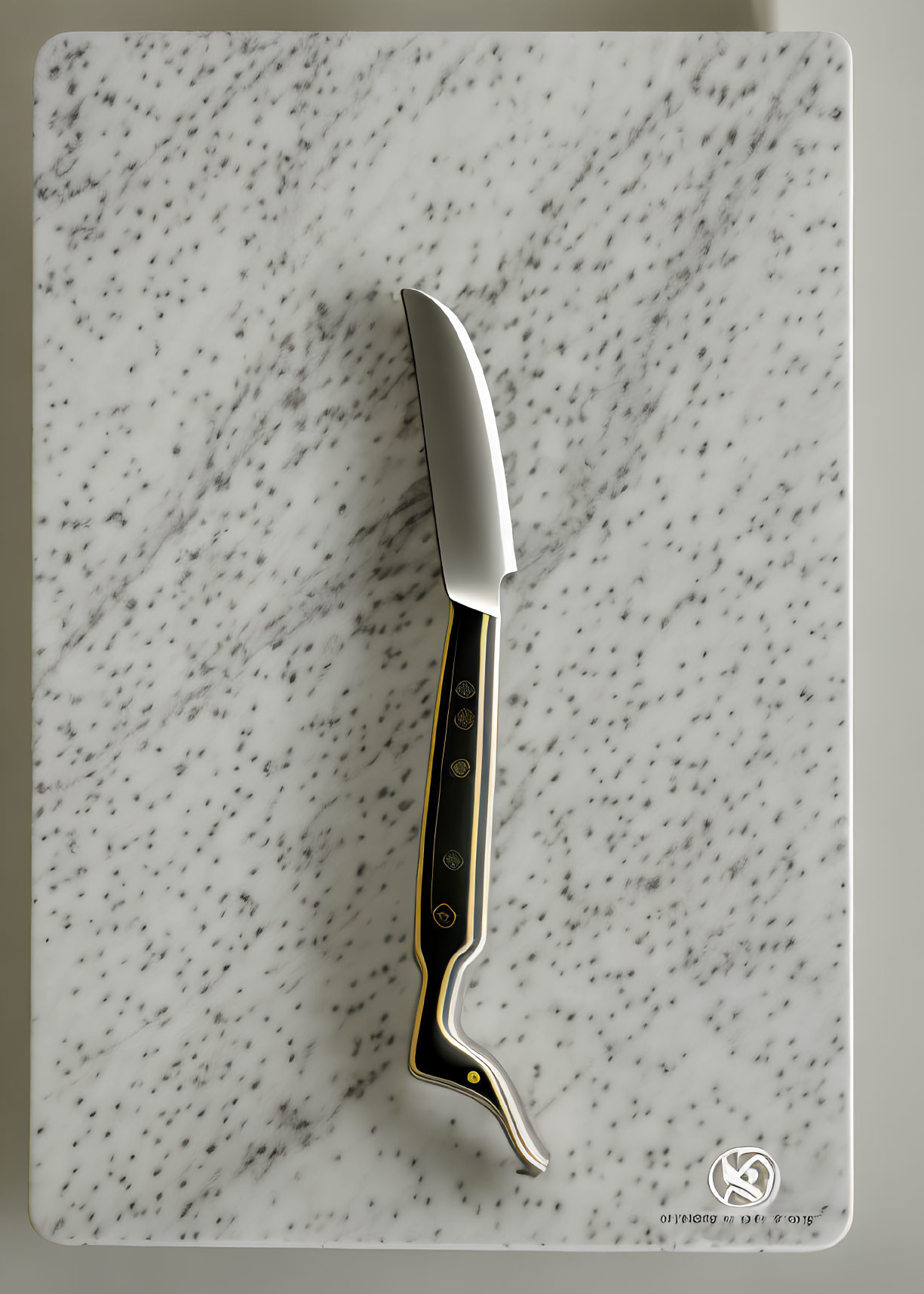 Elegantly Curved Blade Kitchen Knife on White Marble