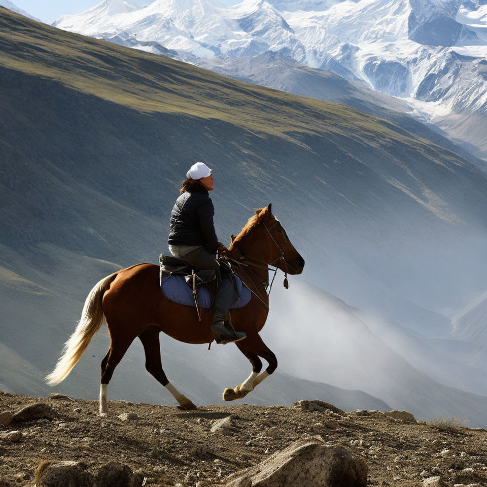 Chestnut Horse Rider in Mountainous Landscape