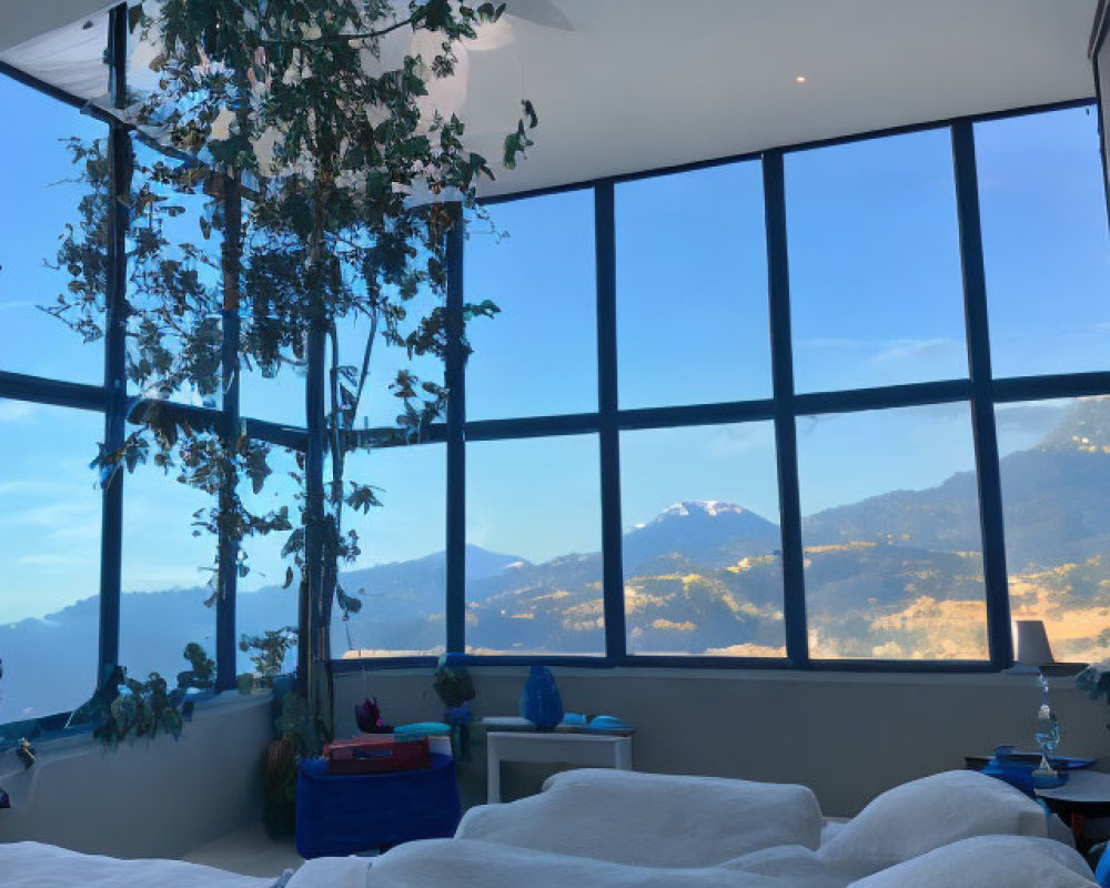 Bedroom with panoramic mountain view and indoor greenery décor