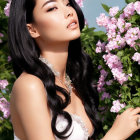 Long Black Hair Person Poses Among Pink Blossoms in Elegant Attire