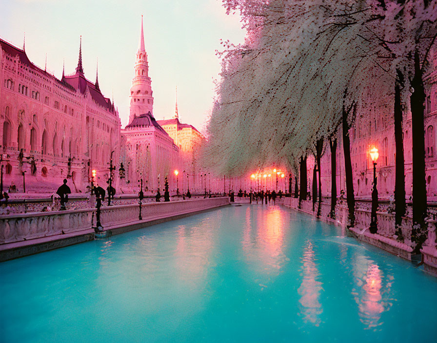 Twilight cityscape with blue canal, pink skies, white trees, and grand building.