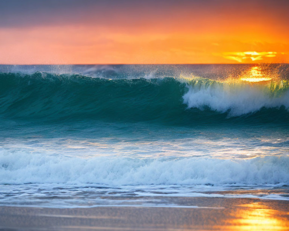 Vibrant orange sunset over ocean with turquoise wave on sandy beach
