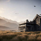 Abandoned industrial buildings in field with mountains and soft sunlight