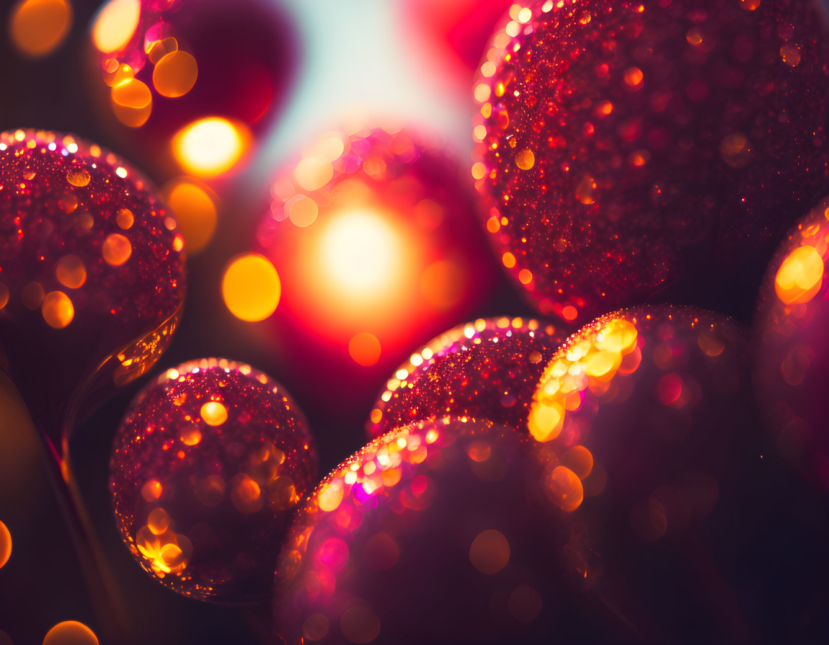 Shiny red ornaments with festive bokeh background