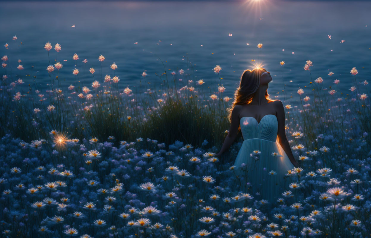 Woman in Blue Dress Surrounded by Glowing Flowers and Firefly Lights