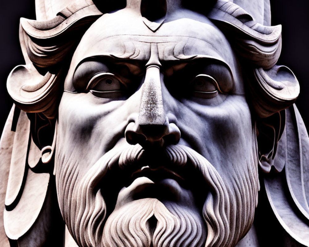 Detailed Stone Statue of Bearded Figure with Crown and Ornate Hair