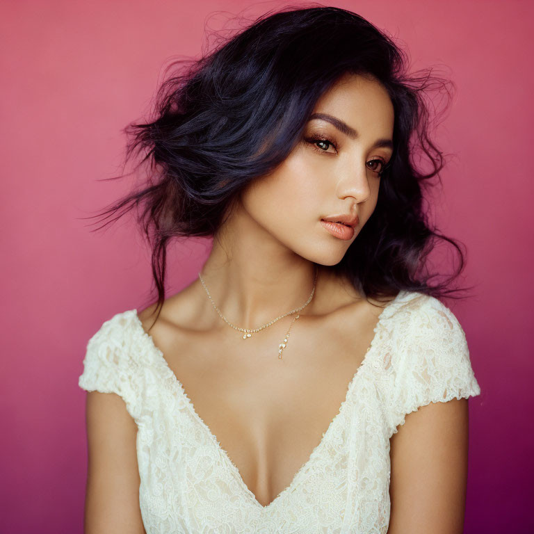 Dark Blue Haired Woman in White Lace Dress on Pink Background