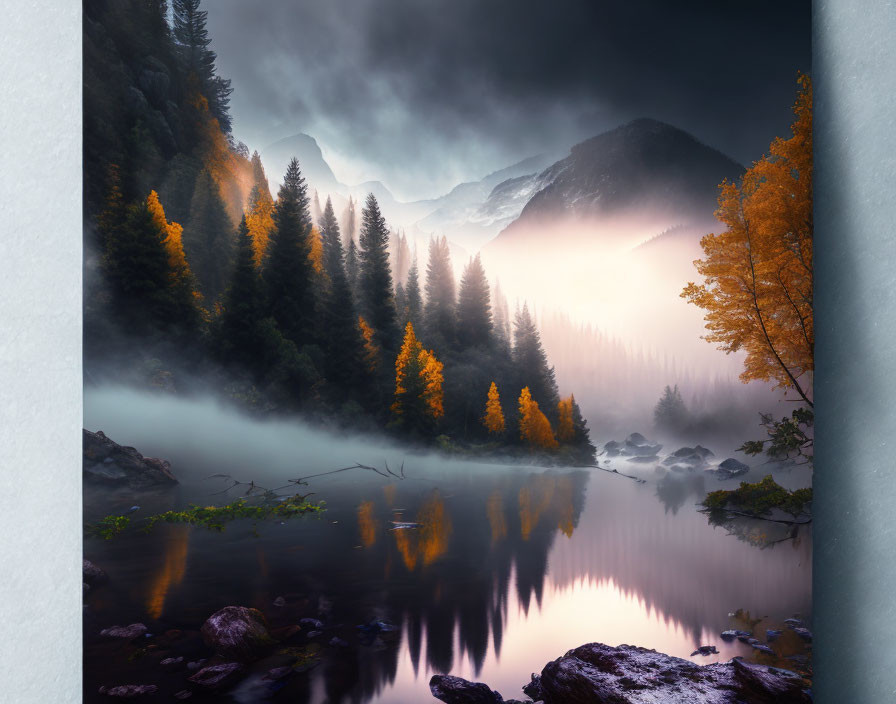 Foggy mountains and autumn trees reflected in tranquil river scene