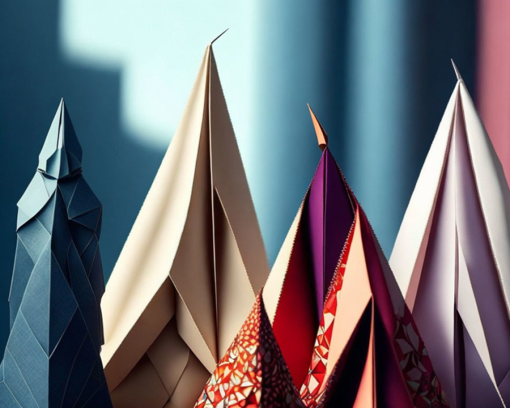 Vibrant paper folds create abstract mountain shapes on soft background