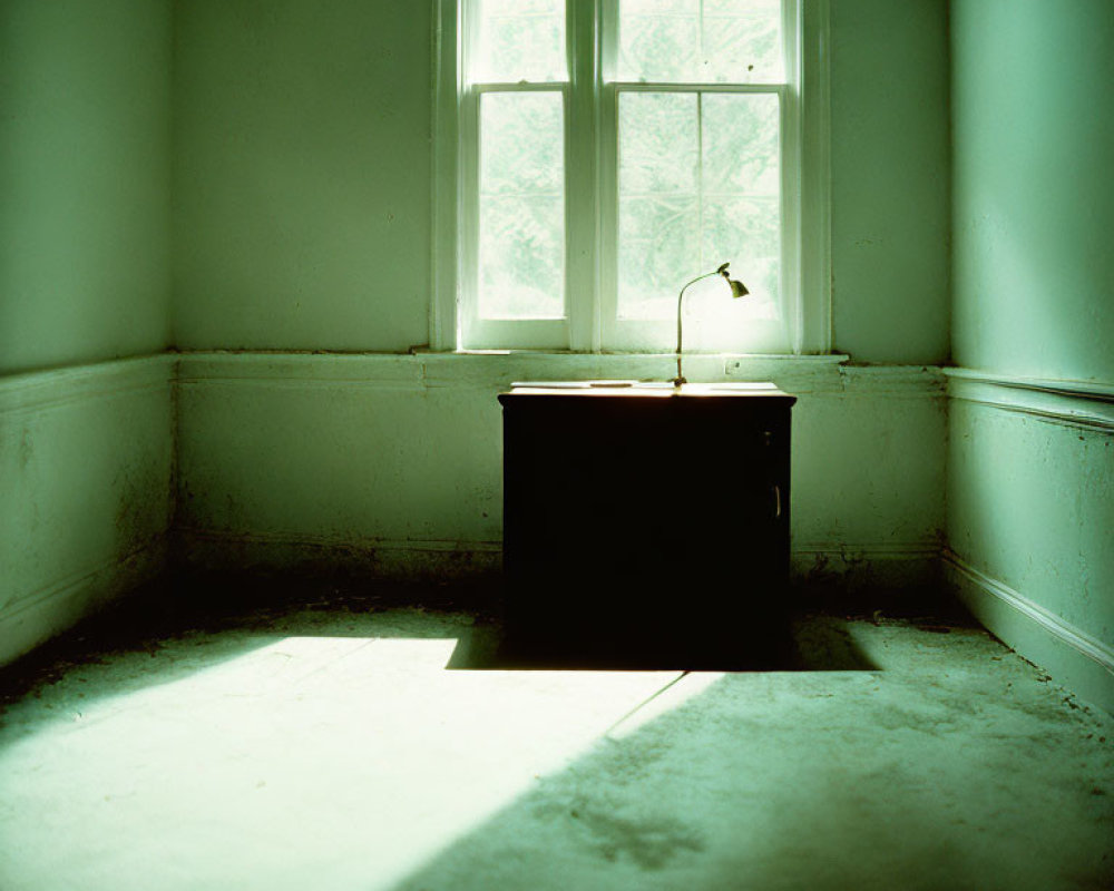 Desk and lamp in room with window light and shadow