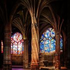 Gothic Cathedral Interior with Stained Glass Windows and Arched Ceilings